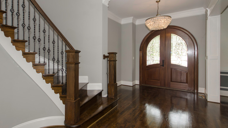 entryway with dark brown floor