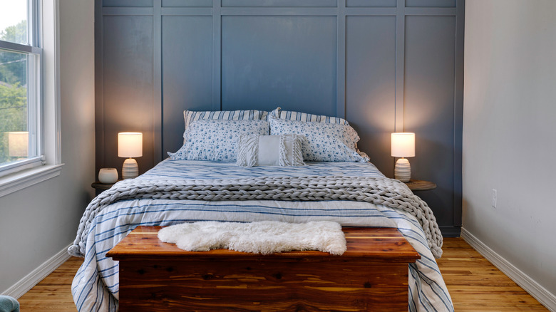 bedroom with blue accent wall