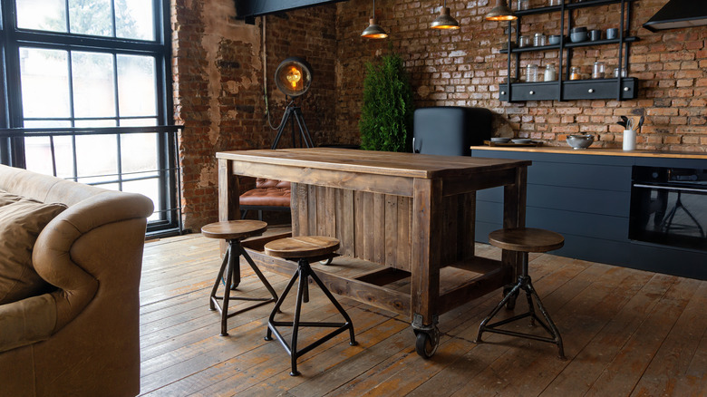 industrial kitchen with wooden island