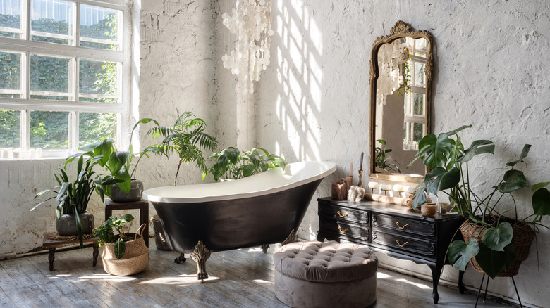 loft bathroom with ornate mirror