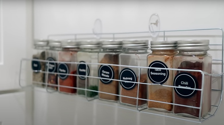 spices stored on wire wall shelf