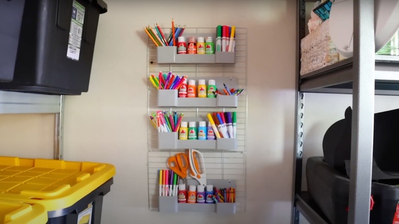 art supplies hanging on wall