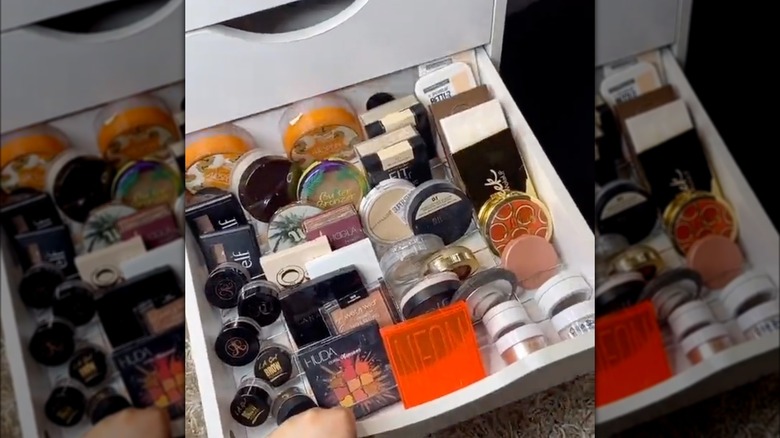 makeup products stored in wire rack