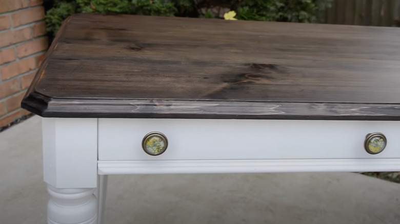 dark stain and white table