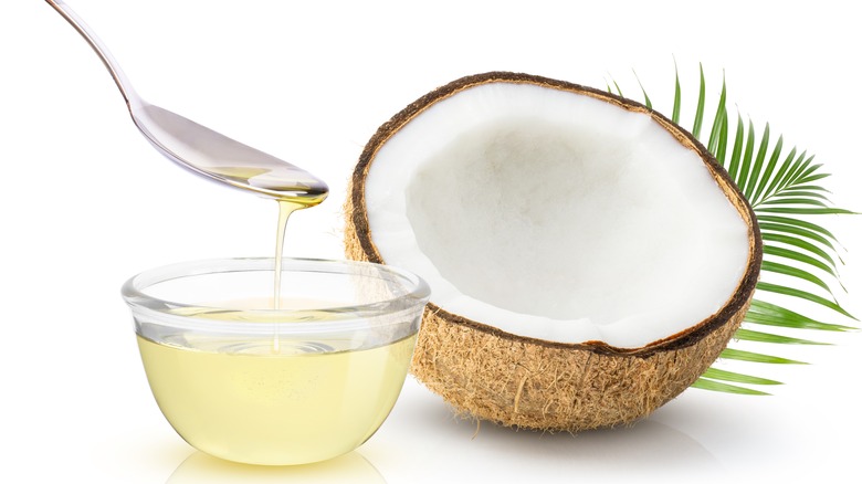 coconut oil next to coconut half