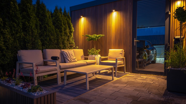 wall lights illuminating patio