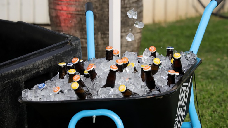 wheelbarrow filled with ice and drinks