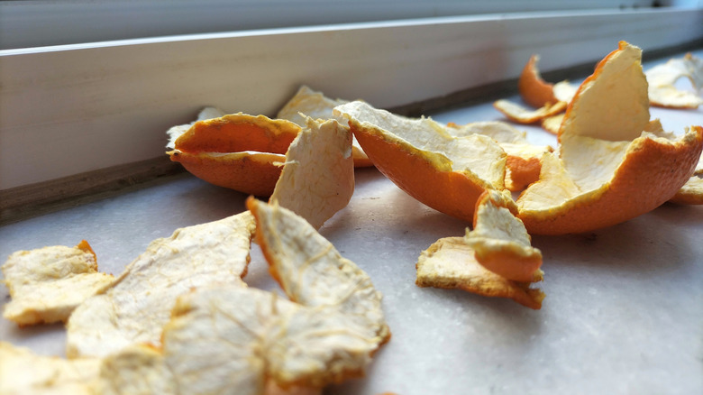 orange peels drying in the sun