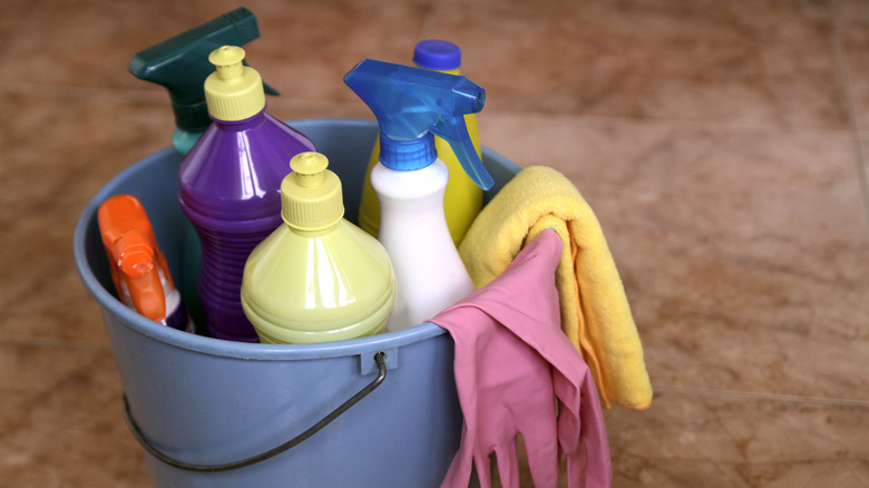 cleaning products in a bucket