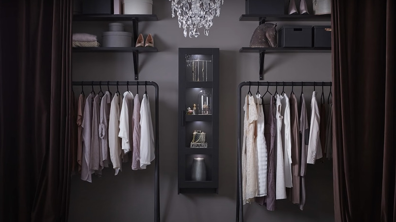 black closet with brown curtains