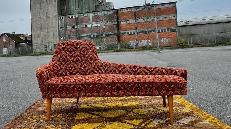 Upholstered IKEA SINGOALLA chair in empty parking lot