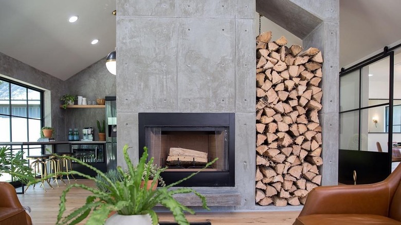 Modern style fireplace with logs