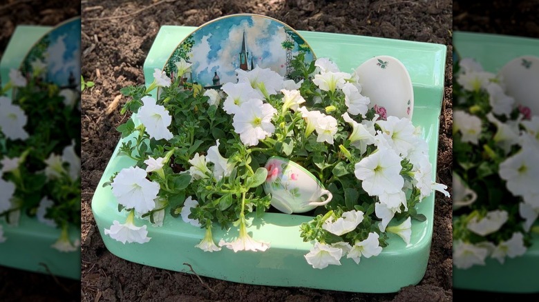 green sink with white flowers