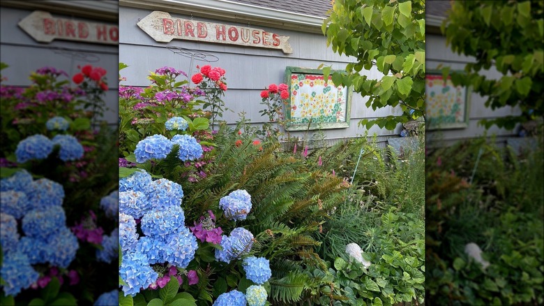 framed tablecloth hanging in garden