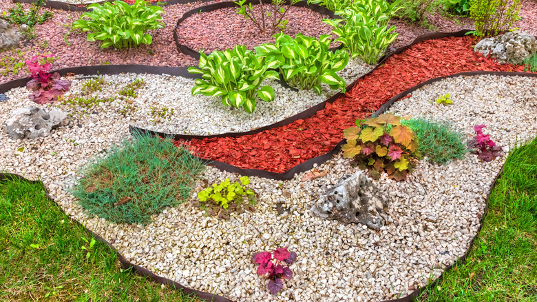 Artistic garden bed with mulch and gravel