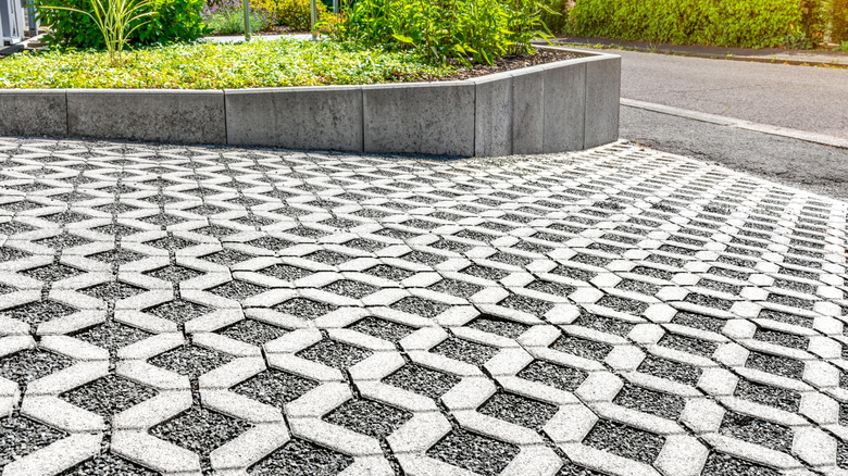 Gravel and concrete grid on driveway