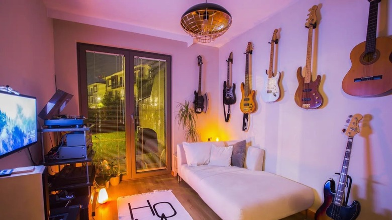 guitars hanging on wall