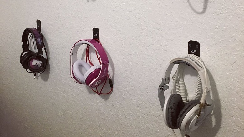 headphones hanging on wall