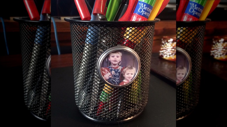 family photo on pencil cup