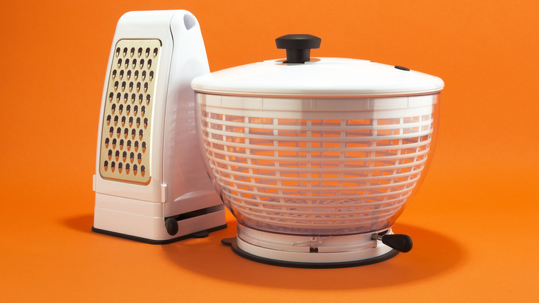 Salad spinner and grater for hashbrowns