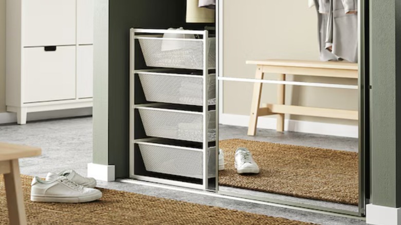 White metal storage drawer unit in a laundry room