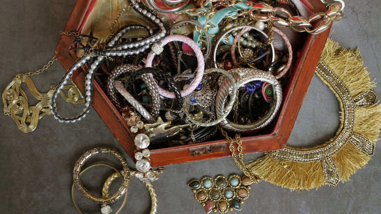 An overflowing jewelry box