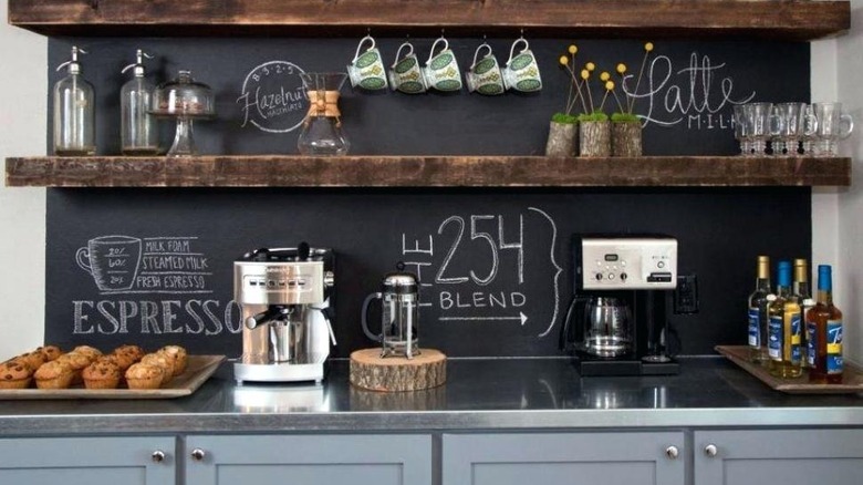 Chalkboard with drawings and quotes in kitchen