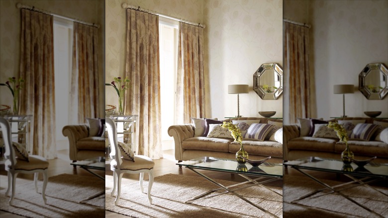 Elegant neutral room with jacquard curtains