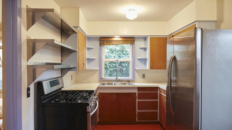 old kitchen with enclosed layout