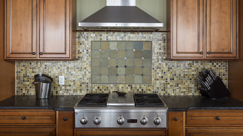 older kitchen with mosaic tile backsplash