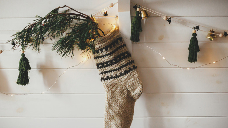 tan stocking on shiplap wall