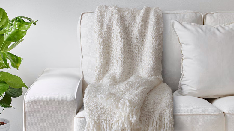 White throw blanket on couch