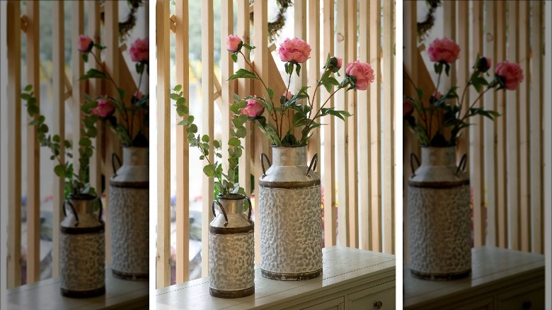 metal vases with flowers