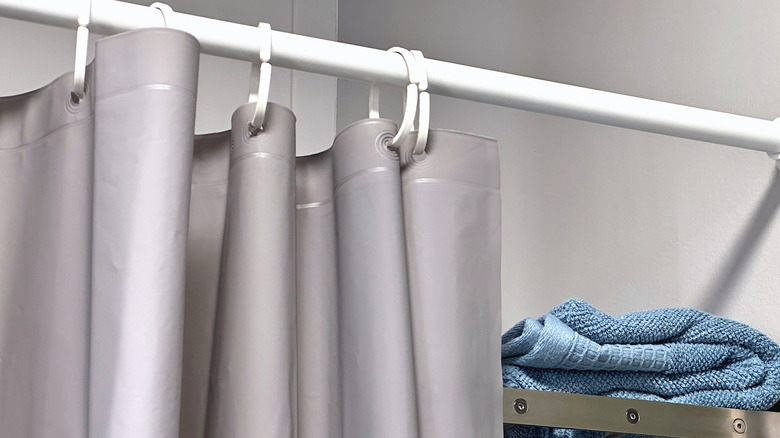 Gray bathroom with gray shower curtain