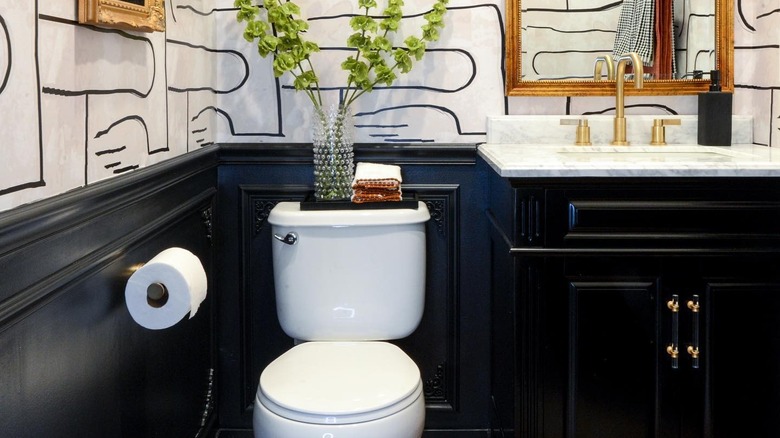 Black wainscoting in guest bath