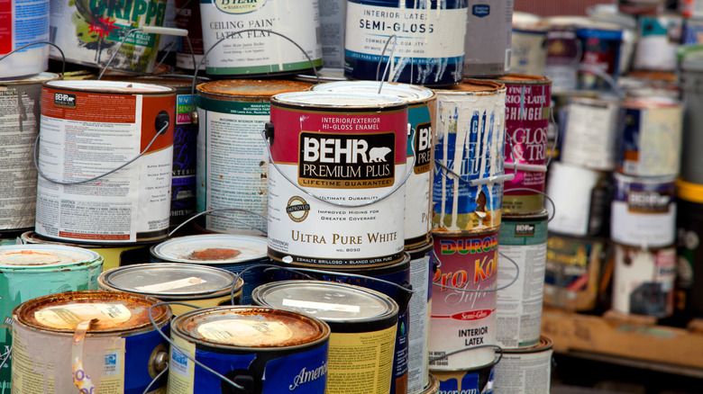 Stack of old paint cans