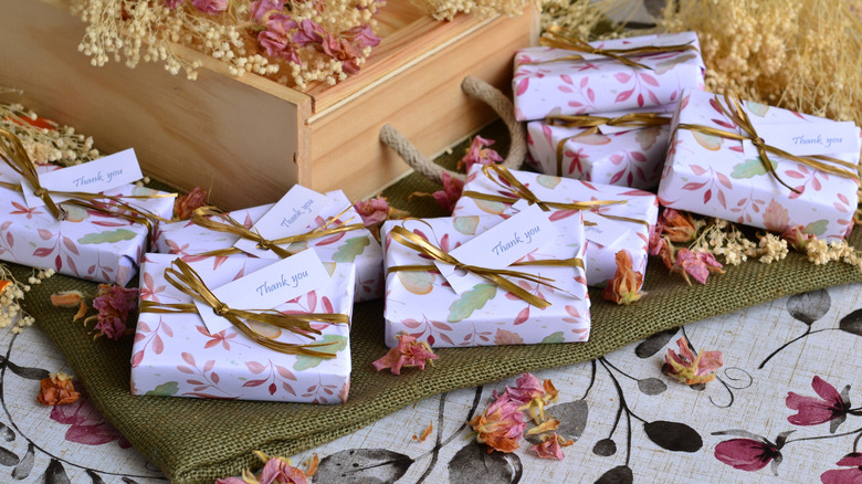 Leaf patterned wallpaper used to wrap presents