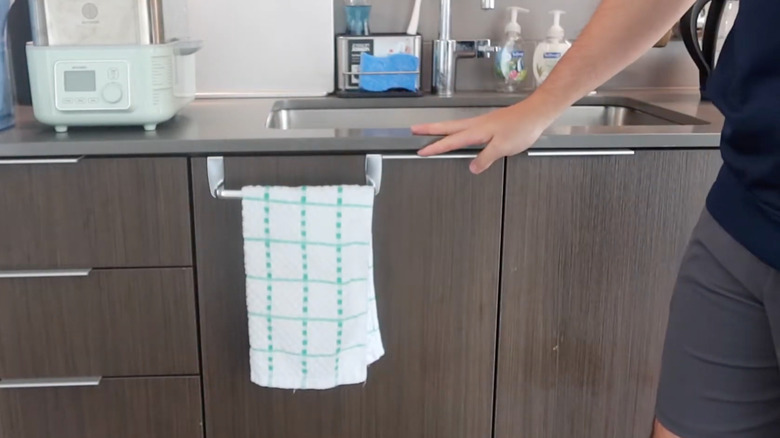 cabinet towel bar hanging dish rag