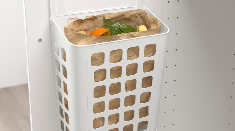 cabinet door trash can food scraps