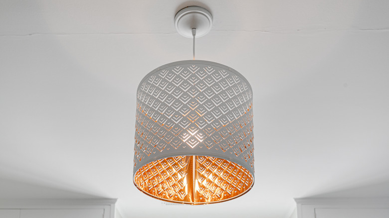 white pendant lamp on ceiling