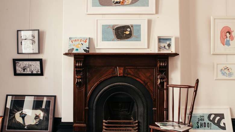 painting and book on mantel