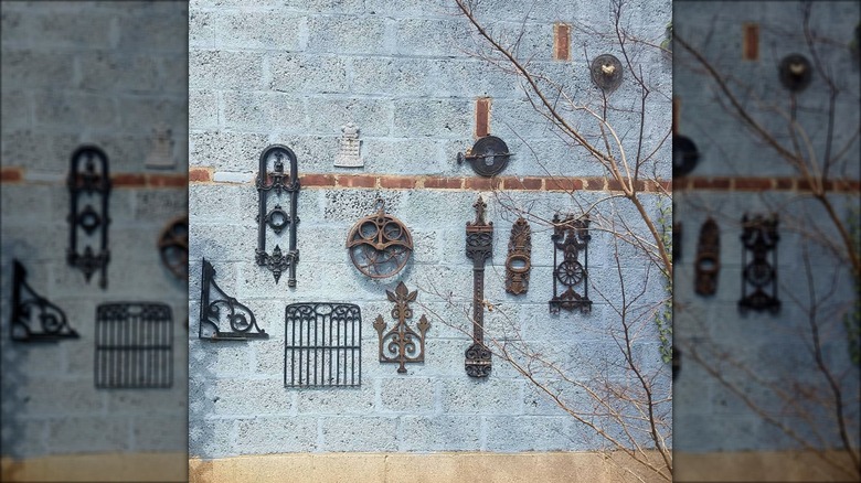 Iron rusted architectural elements on brick wall