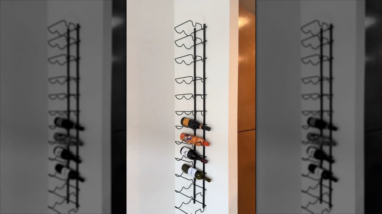 Black wall-mounted wine rack