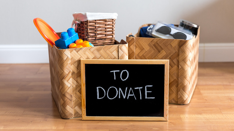 filled boxes with donation sign