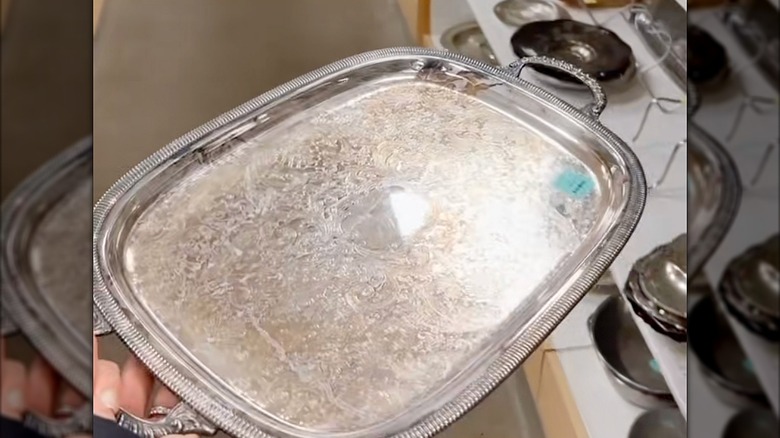 Silver serving tray at a thrift store