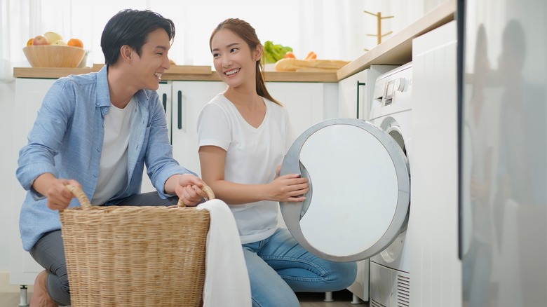 couple doing laundry together