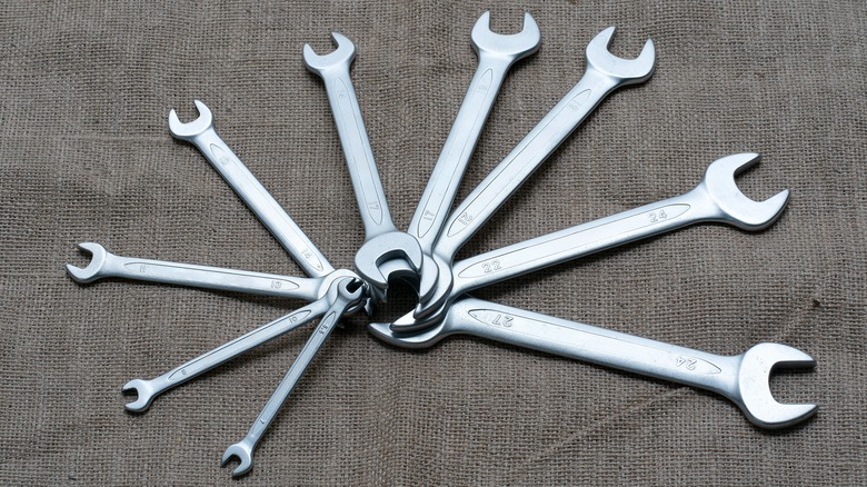 An assortment of open-end wrenches.