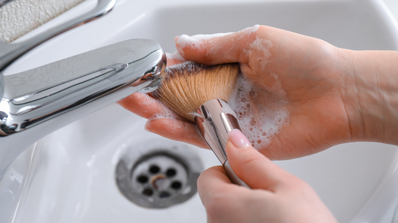 Lathering up a makeup brush