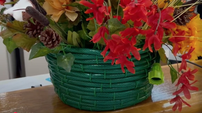 Basket made out of a garden hose