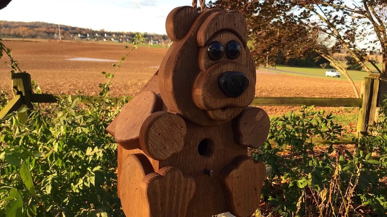 bear shaped wooden birdhouse 